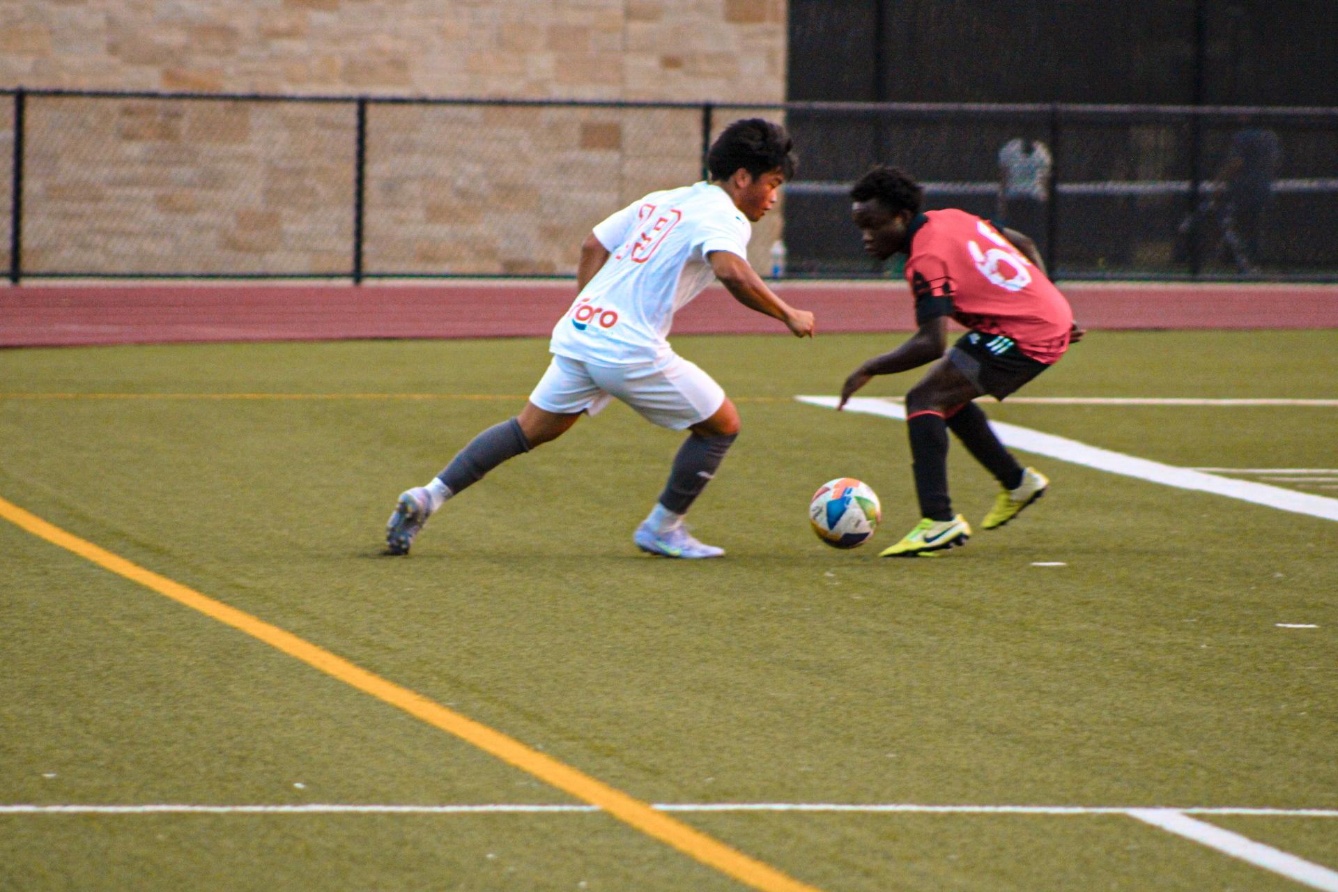 Godfrey playing soccer